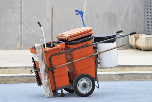 Skip hire company truck at a residential street ready to deliver a skip