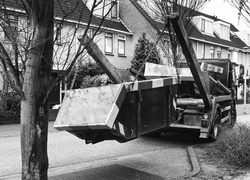 Image of a skip being replaced to resolve a customer issue